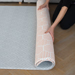 luxury memory foam playmat with stylish coral Dreamer and grey padded play mat little Nomad Totter and Tumble 